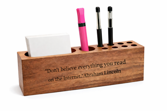 Wooden pen and pencil holder which can be custom engraved with a motivational or funny quote of the buyer's choosing.
